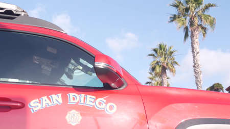 La Jolla, California USA - 23 Nov 2020: Lifeguard red pickup truck, life guard auto by beach. Rescue...