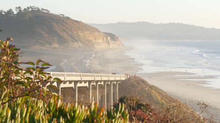 Bridge on pacific coast highway 1, Torrey Pines state beach, Del Mar, San Diego, California USA. Coastal road trip vacations, sunset seat scenic vista view point. Roadtrip on freeway 101 along ocean.の写真素材