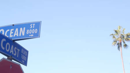 Ocean street road sign on crossroad, California city, USA. Waterfront tourist resort near Los...