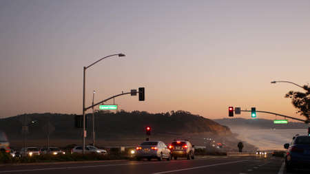 Defocused traffic lights, pacific coast highway 1, Torrey Pines state beach, Del Mar, San Diego,...
