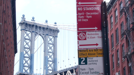 New York City Manhattan Bridge in Dumbo, Brooklyn. Red brick building on Washington street near Water street. Classic NYC industrial architecture. Iconic United States tourist landmark. Travel USA.の写真素材