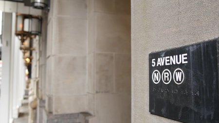 New York subway sign, 5 avenue underground metro station. Metropolitan entrance, fifth ave public transport exit. City street near Central Park and hotel, Manhattan Midtown district, NYC United Statesの写真素材