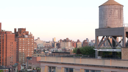 New York City Manhattan skyline cityscape. Rooftop view point, residential district buildings roofs....