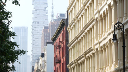 New York City Manhattan Soho fashion district near Broadway street. USA urban building facade, old american architecture. Shopping in NYC, United States. Business and residential real estate. Lanternの写真素材