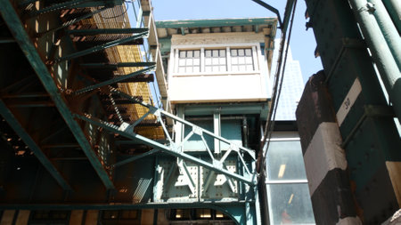 New York elevated subway, metropolitan bridge, metro track above street. Railway transport over...
