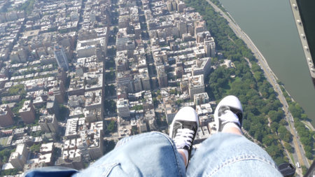 New York City doors off helicopter flight, heli flying over Manhattan West Side houses, United...