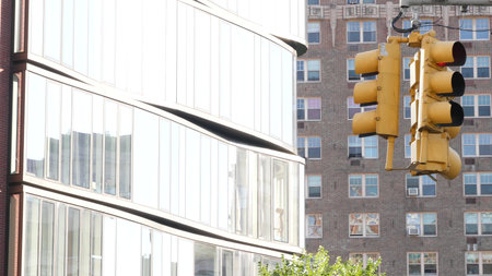 New York City street crossroad, yellow traffic light, transport road intersection, United States....