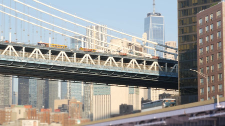New York City Manhattan Bridge to Brooklyn. Waterfront downtown skyline cityscape, USA financial...