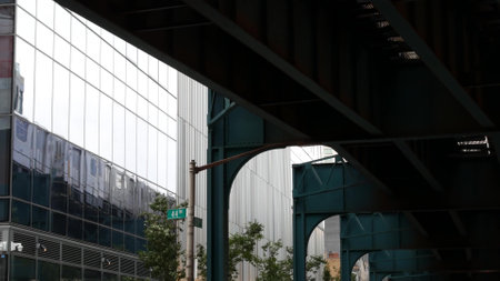 New York elevated subway, metropolitan bridge, metro track above street. Railway transport over...