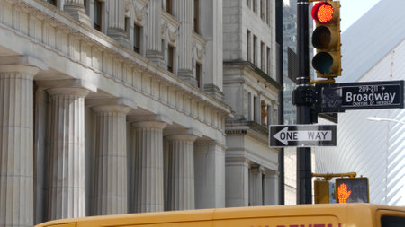 Broadway street road sign, Manhattan downtown financial district architecture, New York City, Fulton street corner. Traffic signage. Yellow traffic light near World Trade Center. Canyon of Heroes.の写真素材