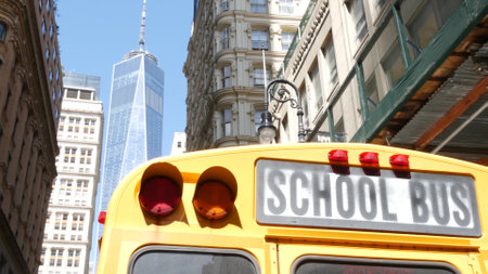 Yellow School Bus. Schoolbus back view on Fulton street, New York City Manhattan Downtown. Children...