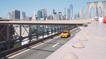 Cars on Brooklyn Bridge. New York City Manhattan downtown skyline, financial district cityscape architecture. World Trade Center, WTC skyscraper. Road traffic to Dumbo and yellow taxi cab. Travel USA.の写真素材