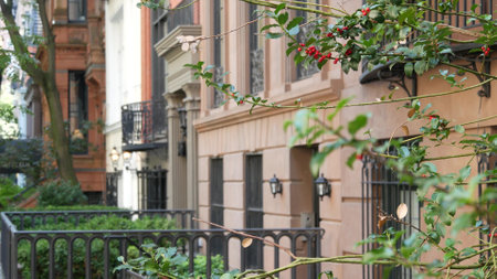 New York City townhouse building, Brooklyn Heights residential district, USA. Brownstone urban...