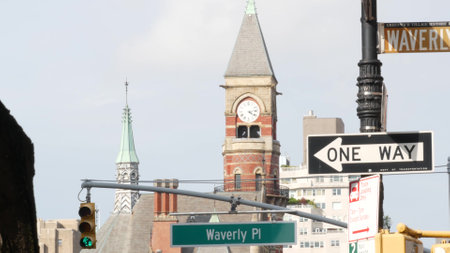 New York City street. Manhattan Greenwich village landmark, United States. Jefferson Market Library building architecture, Courthouse clock tower on 6 sixth Americas avenue, USA. One way road sign.の写真素材