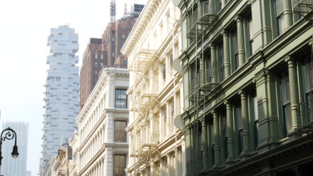 New York City Manhattan Soho fashion district near Broadway street. USA urban building facade, old american architecture. Shopping in NYC, United States. Business and residential real estate. Lanternの写真素材