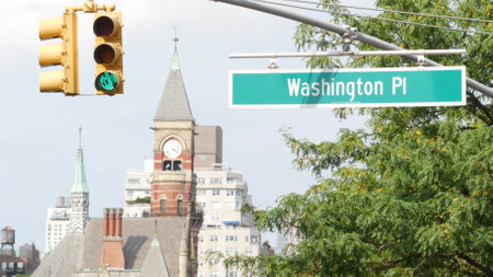 New York City street. Manhattan Greenwich village landmark, United States. Jefferson Market Library building architecture, Courthouse clock tower, 6 sixth Americas avenue, USA. Washington Pl road signの写真素材