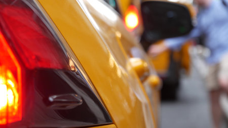 New York City Grand Central Terminal railway station, 42 street. Manhattan Midtown. Yellow taxi cab row, car transport on Pershing Square, NYC, USA. American urban road traffic, people pedestrians.の写真素材