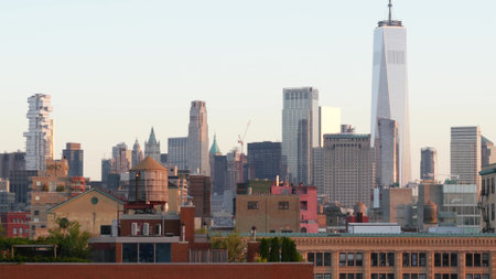 New York City Manhattan downtown skyline cityscape. Financial district rooftop view from Chelsea, Midtown. Buildings roofs. urban architecture, United States. World Trade Center and water tower tank.の写真素材
