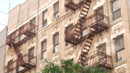 New York City classic building architecture, Manhattan, USA. Urban residential house exterior. Real...