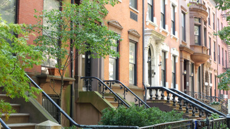 New York City townhouse building, Brooklyn Heights residential district, USA. Brownstone urban...