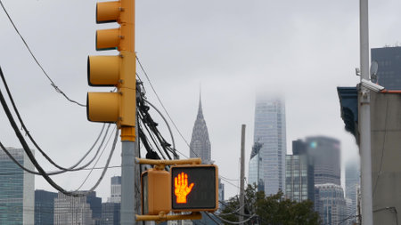 New York City street crossroad, yellow traffic light, transport road intersection, United States....