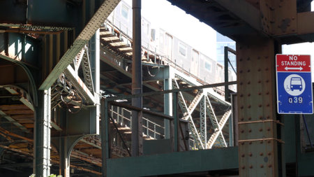 New York elevated subway, metropolitan bridge, metro track above street. Railway transport over...