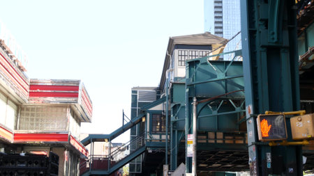 New York elevated subway, metropolitan bridge, metro track above street. Railway transport over...