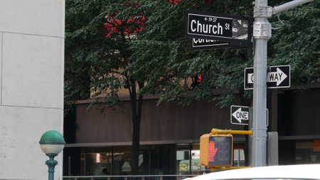 New York City crossroad, Church street intersection, one way road sign. Manhattan downtown, United States. Corner roadsign. NYC subway globe, metro entrance orb lamp. Pedestrian traffic light.の写真素材