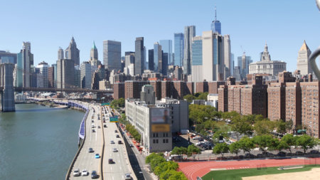 Brooklyn Bridge from Manhattan Bridge. New York City downtown skyline, financial district cityscape,...