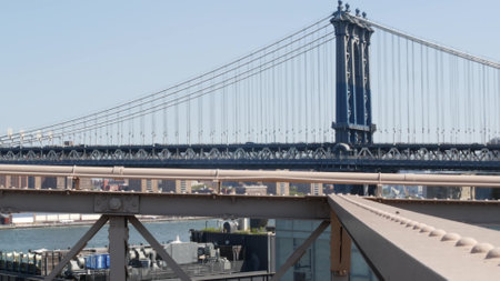 New York City Manhattan Bridge from Brooklyn Bridge view. USA travel landmark, NYC skyline cityscape. Iconic architecture over East River water. Visit United States of America.の写真素材