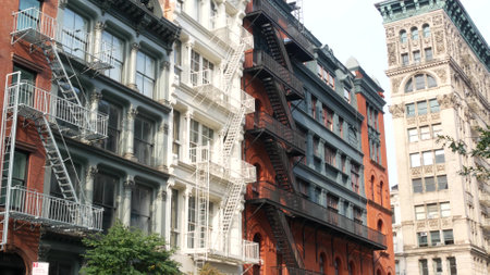New York City Manhattan Soho fashion district, Broome street near Broadway. USA urban building facade, old classic american architecture in NYC, United States. Business and residential real estate.の写真素材
