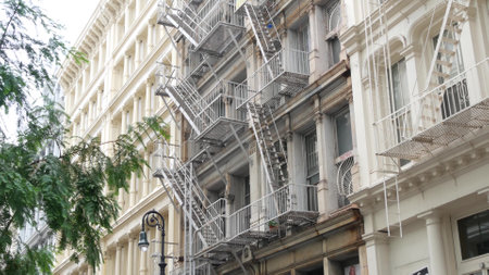 New York City Manhattan Soho fashion district near Broadway street. USA urban building facade, old classic american architecture. Shopping in NYC, United States. Business and residential real estate.の写真素材