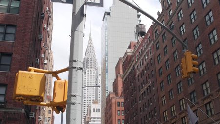New York City crossroad, Lexington street intersection road sign post. Chrysler building, Midtown district, NYC, United States. Highrise skyscraper architecture, corner one way roadsign, traffic lightの写真素材