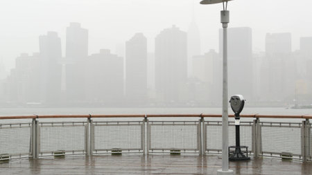 New York City waterfront skyline, Manhattan Midtown buildings, riverfront skyscrapers by East river. Waterside cityscape, tower viewer, Gantry Plaza. Long Island, Queens. United States tourism. Rainy.の写真素材