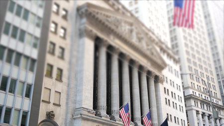 New York City, United States. Lower Manhattan Downtown Financial District urban architecture exterior. American flag. Wall street Stock Exchange building facade columns, USA Stock Market trading, NYC.の写真素材