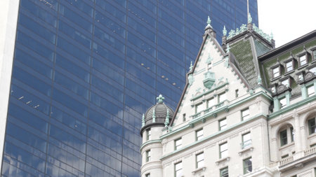 New York City Manhattan Midtown. Central park on 5th Fifth 5 avenue, USA. American landmark, urban public park in NYC, United States. Hotel building architecture from Grand Army Plaza, Pulitzer Plaza.の写真素材