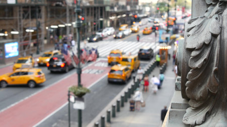 New York City Grand Central Terminal railway station, 42 street. Manhattan Midtown. Yellow taxi cab row, car transport and Pershing Square bridge, NYC, USA. American road traffic, people pedestrians.の写真素材