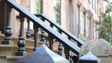 New York City townhouse building, Brooklyn Heights residential district, USA. Brownstone urban...
