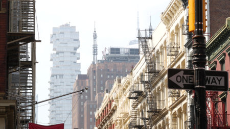 New York City Manhattan Soho fashion district near Broadway street. USA urban building facade, old classic american architecture. Shopping in NYC, United States. Business and residential real estate.の写真素材