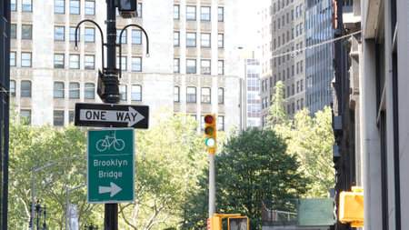 Bike lane road sign, New York. Brooklyn Bridge bicycle path, cycle route in Manhattan downtown....
