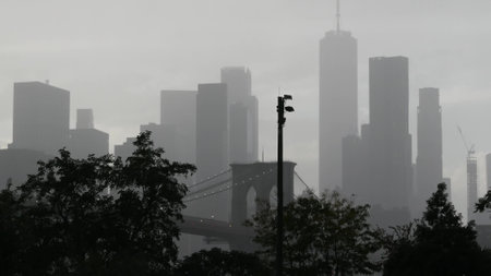 Brooklyn Bridge, rainy foggy day. New York City Manhattan downtown skyline architecture, financial district cityscape, United States. World Trade Center, WTC skyscraper view from Dumbo. Autumn in USA.の写真素材