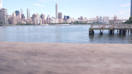 New York City waterfront skyline, Manhattan Midtown buildings, riverfront skyscrapers by East river water. Waterside cityscape view, Gantry Plaza pier, Long Island, Queens. United States architecture.の写真素材