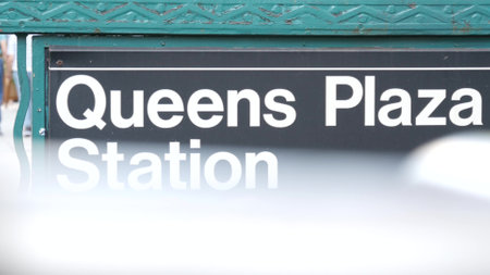New York subway sign, Queens underground metro station. Metropolitan entrance fence, public...