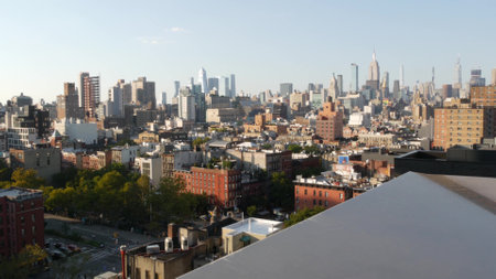 New York City, United States - 7 Sept 2023: Manhattan skyline cityscape. Empire State Building, Hudson Yards. Rooftop, residential house roof. Urban street architecture. Midtown district, East Villageのeditorial素材