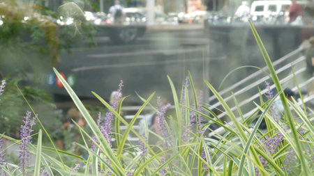 New York City, United States - 11 Sept 2023: Manhattan Midtown Lexington avenue, United States. Defocused people pedestrian, underground metro subway station, stairs on 53 street, urban USA. Greenery.のeditorial素材