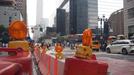 New York City, United States - 29 Aug 2023: Manhattan Midtown 34 street, 8 avenue crossroad intersection. Urban road car traffic in USA. People pedestrians on zebra. Yellow taxi, Empire State buildingのeditorial素材