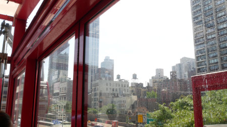 New York City, United States - 4 Sept 2023: Roosevelt Island tramway to Manhattan Midtown streets. American cable tram, Queensboro Bridge. Urban public transport, USA. Building architecture cityscape.のeditorial素材