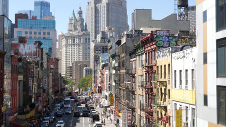 New York City, United States - 14 Sept 2023: Manhattan Chinatown East Broadway street, chinese ethnic district architecture, little Fuzhou, USA. World trade Center tower in Downtown. Manhattan Bridge.のeditorial素材