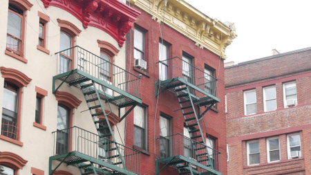 New York City classic building architecture, Manhattan, USA. Urban residential house exterior. Real...