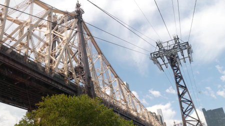 New York City, United States - 4 Sept 2023: Roosevelt Island tramway to Manhattan Midtown. American aerial cable tram near Queensboro Bridge. Urban public transportation, passenger transport in USA.のeditorial素材
